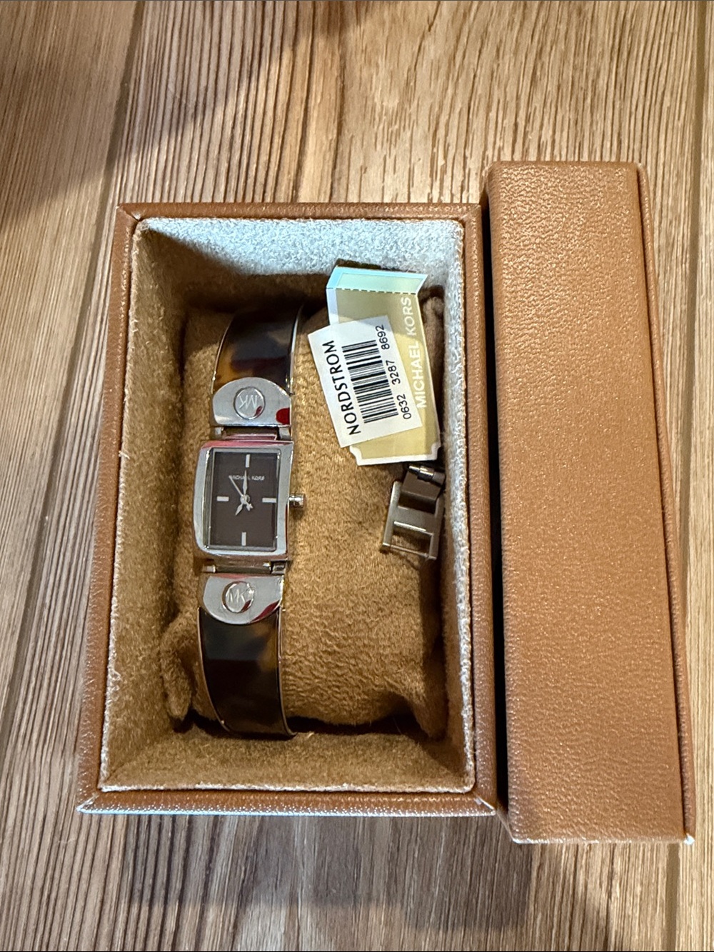 Michael Kors tortoise shell and silver watch
